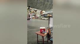 Ghost motorcycle skids down wet road without rider