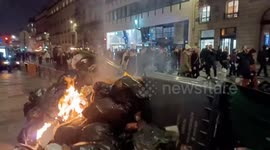 People protest against pension reform in the streets of Paris, France