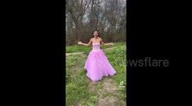 Prom-goer spends $45 on wedding dress and turns it pink during DIY project (extended)