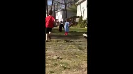 This about sums up our life in 18 seconds. Playing outside the girl is singing and the joy hits his head with a board in an attempt to break it.
