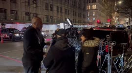 News and police vehicles in the area where Trump may appear in New York, USA