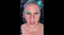 Face painter adds magic to her mermaid design by singing a song from The Little Mermaid