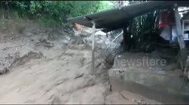 Intense footage shows houses being swept away during Indonesian flood