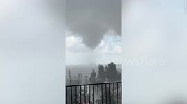 Video shows large, dark funnel cloud as tornado hits Montebello, California