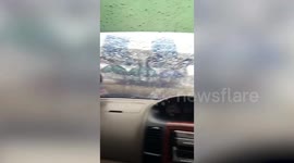 Storm blows away tents amid heavy rain and hail in northeast Thailand
