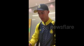 Cristiano Ronaldo makes fans' days by signing shirt and giving them a hug