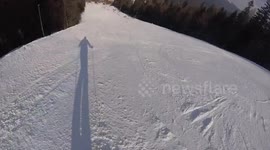 nice filming perspective of a beautiful ski day