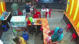 Two injured when truck smashes into family's car in front of restaurant
