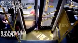 Terrifying moment bus in China drags girl along road after her foot gets trapped in doors
