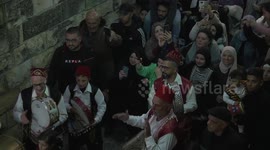 Palestinians attend the