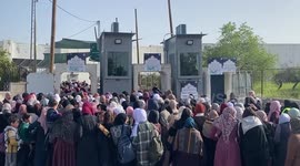 Palestinian Muslim worshippers heading to Jerusalem's Al-Aqsa Mosque compound to attend the first Friday prayer of the holy month of Ramadan, cross an Israeli held checkpoint in Bethlehem