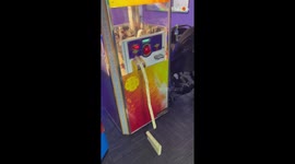 Boy wins big in the arcade by feeding the ticket machine over 2,000 tickets