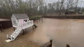 Flooded garden as tornado-warned storm brings heavy rains to Arkansas, US