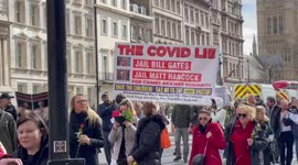 Large group accusing UK government of “lies” told during Covid pandemic march to Downing Street