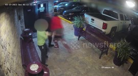 Incredibly intese clip shows Florida strip club bouncer fighting off armed gunman in devil mask