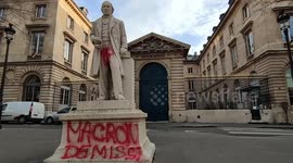 Paris monuments smeared with paint against new immigration law