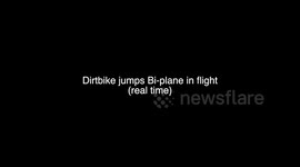 Aussie motorbike rider jumps flying biplane at airshow