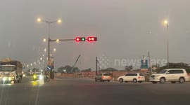 Confusing traffic lights baffle drivers at intersection in Cambodia