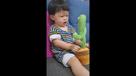Baby girl baby talks with talking cactus