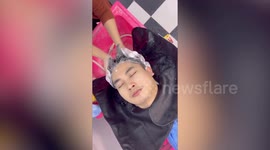 Shower turns into hilarious facial scrub for surprised salon customer in Thailand