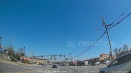 Close Call: White SUV Abruptly Pulls out Into Second Lane Unaware of Oncoming Traffic