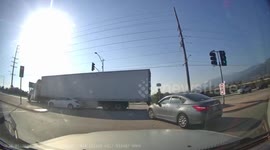 Crash: Truck Driver Running a Red Light Causes a Serious Collision