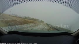 Close Call: Vehicle Completely Loses Control Driving on Icy Road