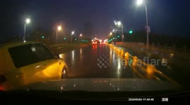 Close Call: White Suzuki Driving Extremely Close to Vehicle Risking a Collision