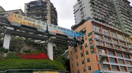 This is what it looks like riding a train through a 20-storey residential building in China