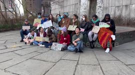People chant for climate justice at climate strike in New York, USA