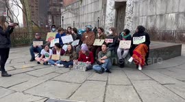 People sing Climate Justice Now at the  climate strike in New York, USA
