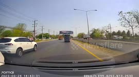 Overloaded pickup truck spins out of control when tires explodes
