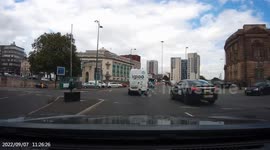 Close Call: Uber Driver Almost Crashes Into Another Vehicle On a Roundabout