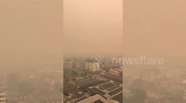 'Disaster zone' pollution clouds roads in northern Thailand