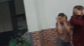 Huge glass windows blown from frames during tropical storm in northeast Thailand