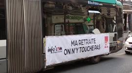 French pension reform: a protest banner was hung on a Parisian RATP (Régie Autonome des Transports Parisiens) bus by the CGT (Confédération Générale du Travail) (= general labor confederation) against the retirement reform. 29 march 2023. Paris, France, r
