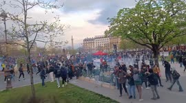 Police clash with protesters at the protest against pension reform in Paris, France