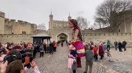 Giant puppet Little Amal walks around the Tower of London