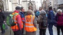 Just Stop Oil activists enjoy free food at Lawyers Are Responsible rally outside the Royal Courts of Justice