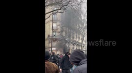 Fire in the streets of Paris, France at the pension reform protest