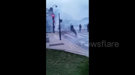 Intense clashes erupt in Paris as pension protesters, police left in cloud of smoke