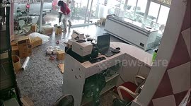 Violent squalls hammer roads during summer storm in northeast Thailand