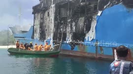 Philippines coastguards search ferry fire wreckage as death toll reaches 31