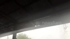 Raging storm rips roof from resident's shed in Thailand