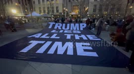 “Trump Lies All The Time” reads banner across from Manhattan Criminal Courthouse