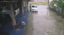 Gales blow steel barrier away during storm in Thailand