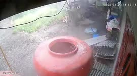 Storm whips through home blowing away iron sheets in northern Thailand