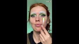 Makeup artist takes a crack at stealing Christmas by transforming herself into Grinch