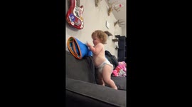 Adorable baby girl doesn't even TRY TO HIDE her dislike for dryer sheets