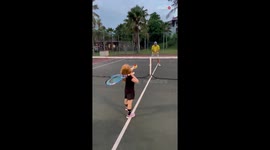 Young tennis fan is supremely proud of herself for playing 'like a big girl'